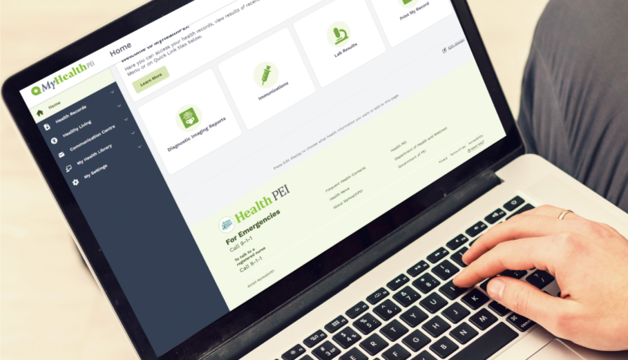Person using a laptop with the MyHealth PEI website open