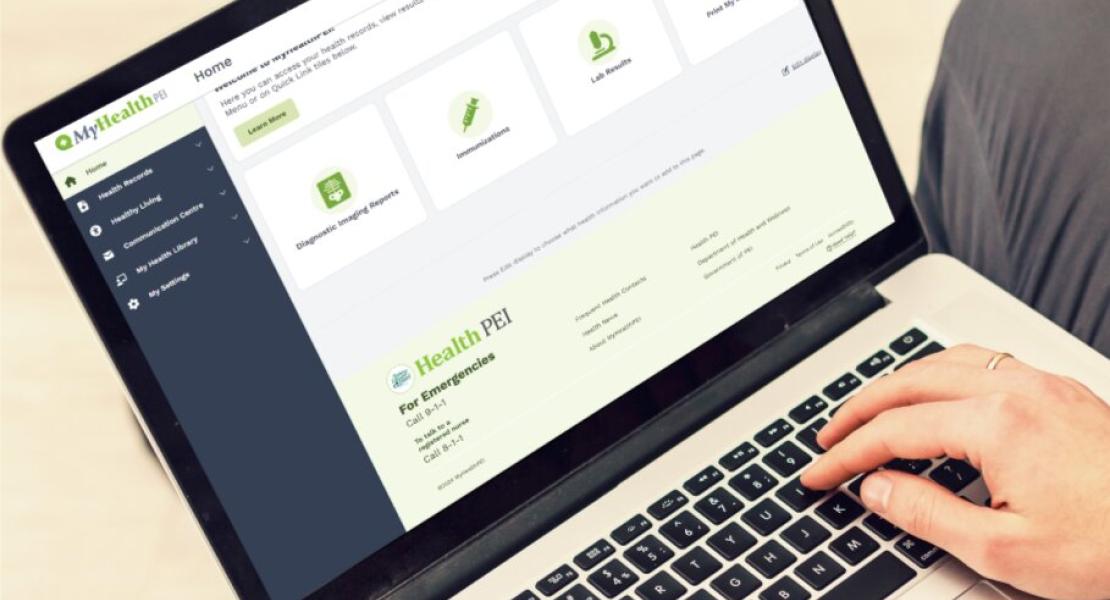 Person using a laptop with the MyHealth PEI website open